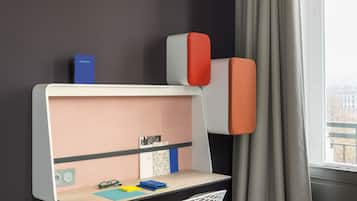 Work in comfort with a compact desk and shelf, perfect for staying productive.