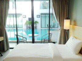 Twin Room, Pool Access | In-room safe, blackout drapes, iron/ironing board, rollaway beds