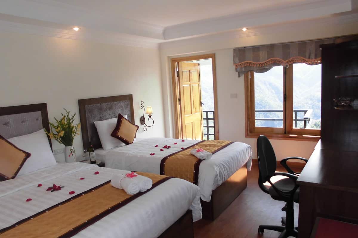 Balcony Suite Family Mountain View | Minibar og lydisolert