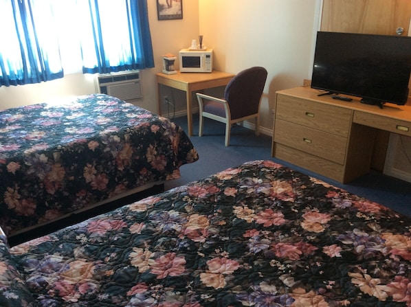 Desk, blackout curtains, iron/ironing board, WiFi