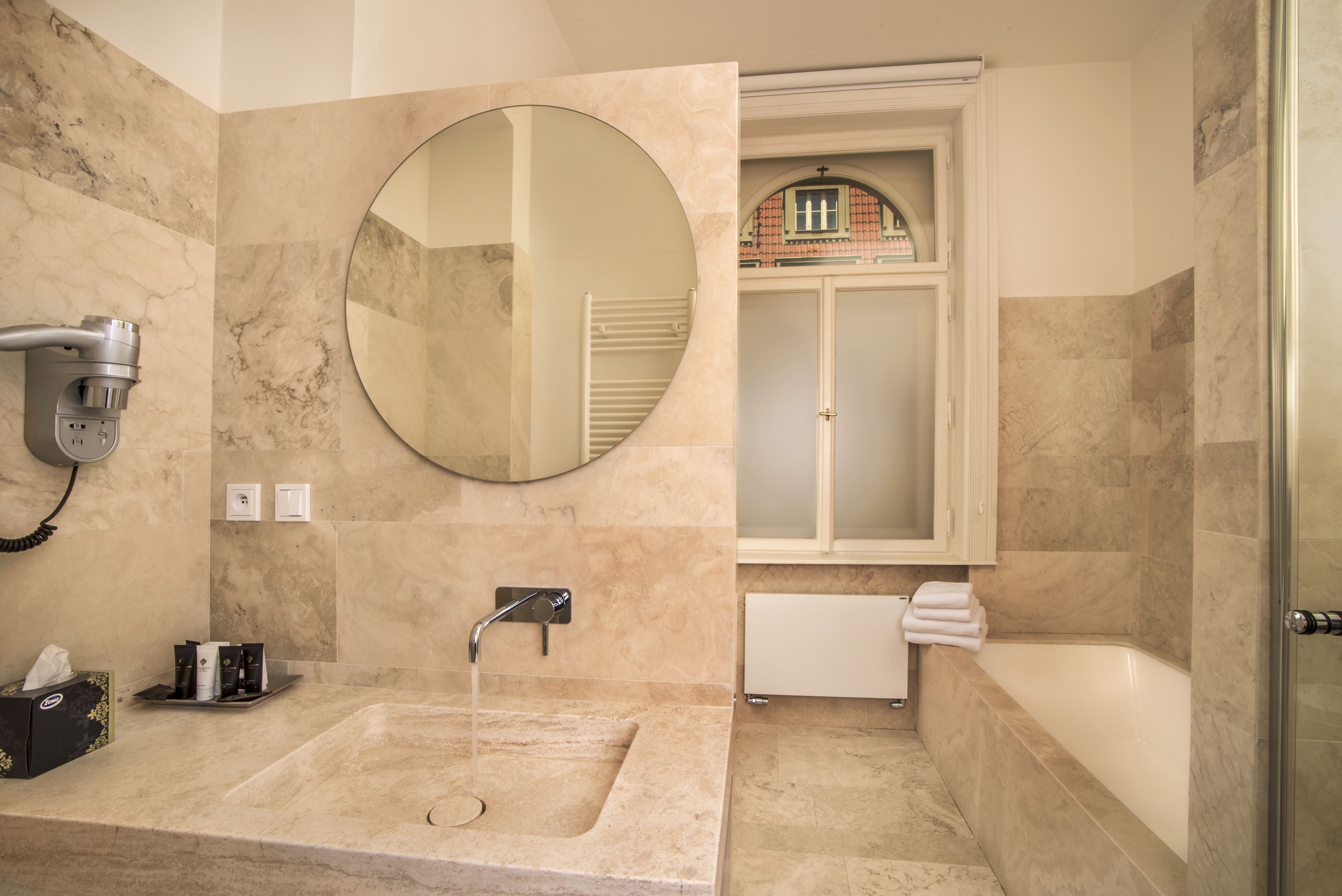 luxury double room, 1 bedroom, corner | bathroom | designer toiletries, hair dryer, slippers, towels