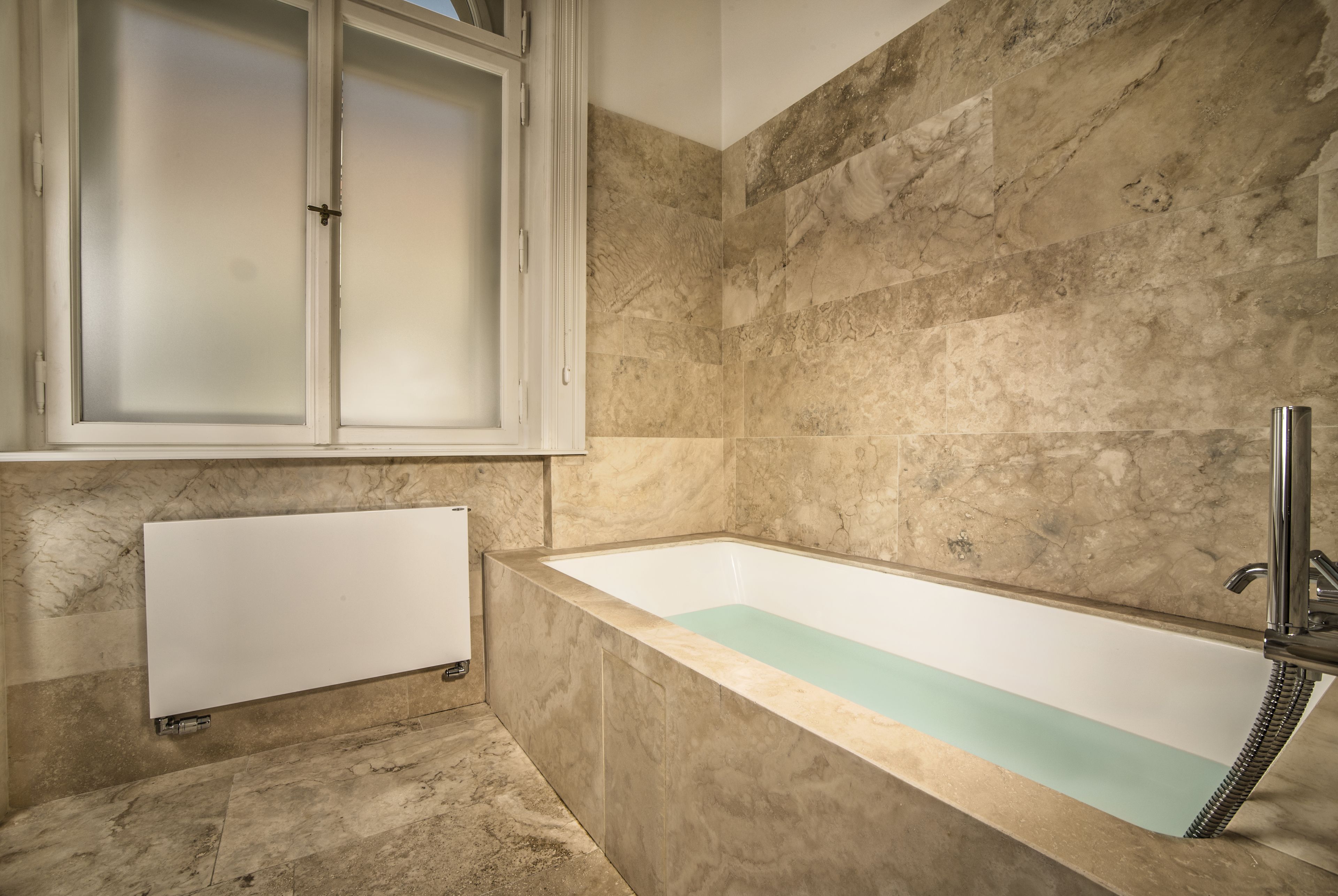 luxury double room, 1 bedroom, corner | bathroom | designer toiletries, hair dryer, slippers, towels