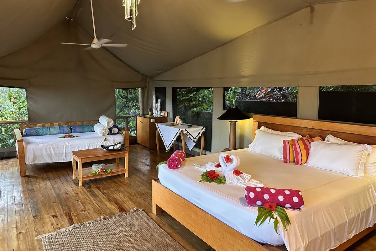 luxury african safari tent | 1 bedroom, premium bedding, pillow-top beds, minibar