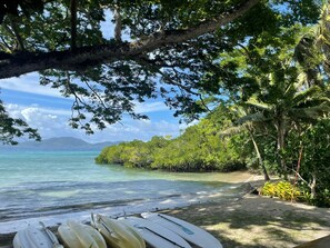 On the beach, sun loungers, beach towels, scuba diving