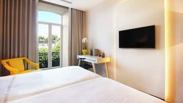 Premium bedding, memory-foam beds, minibar, in-room safe