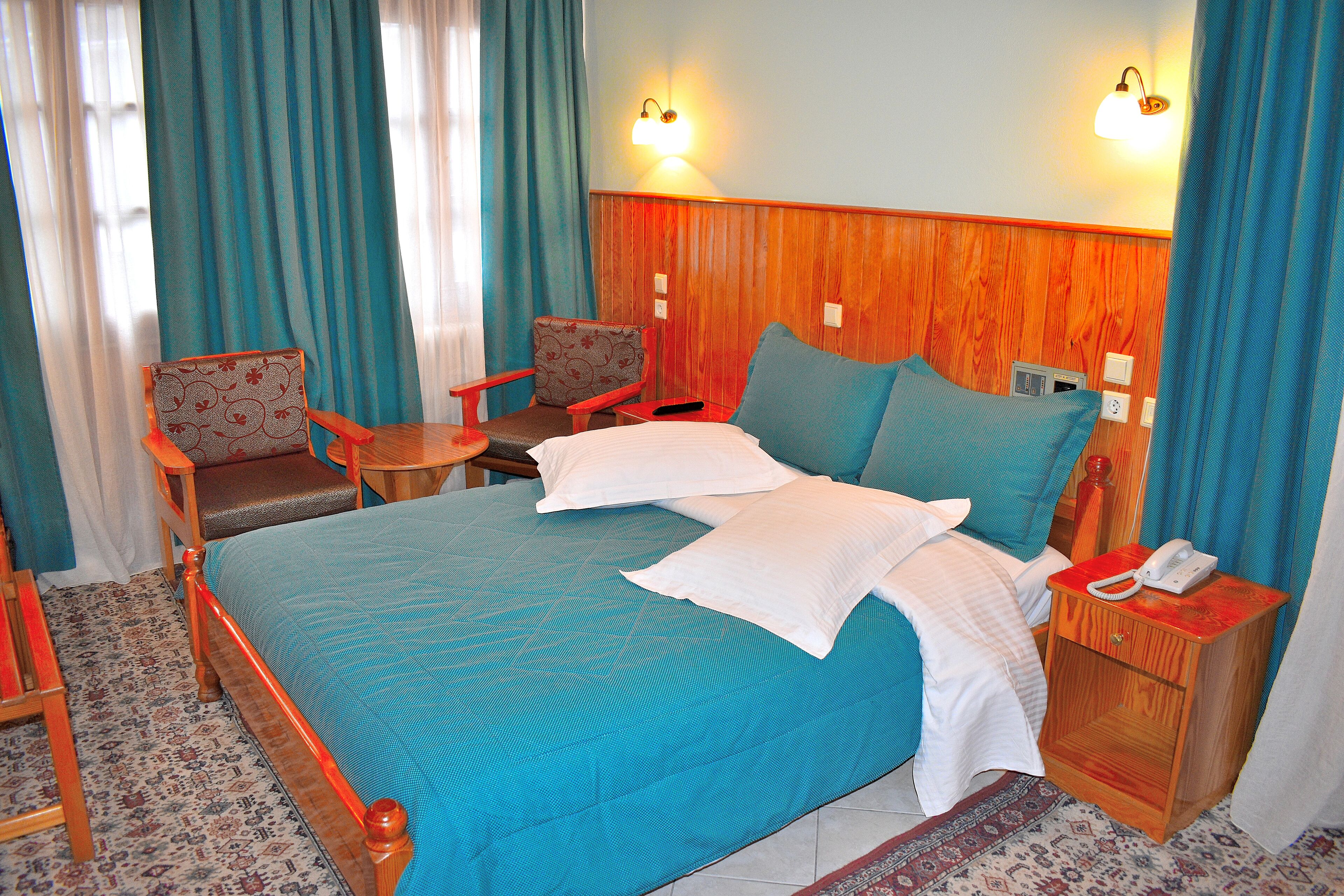 blackout curtains, soundproofing, free wifi, bed sheets