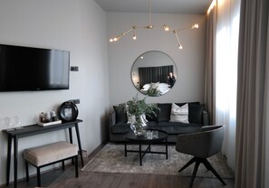 Deluxe Double Room with Spa Access | Living area | Flat-screen TV