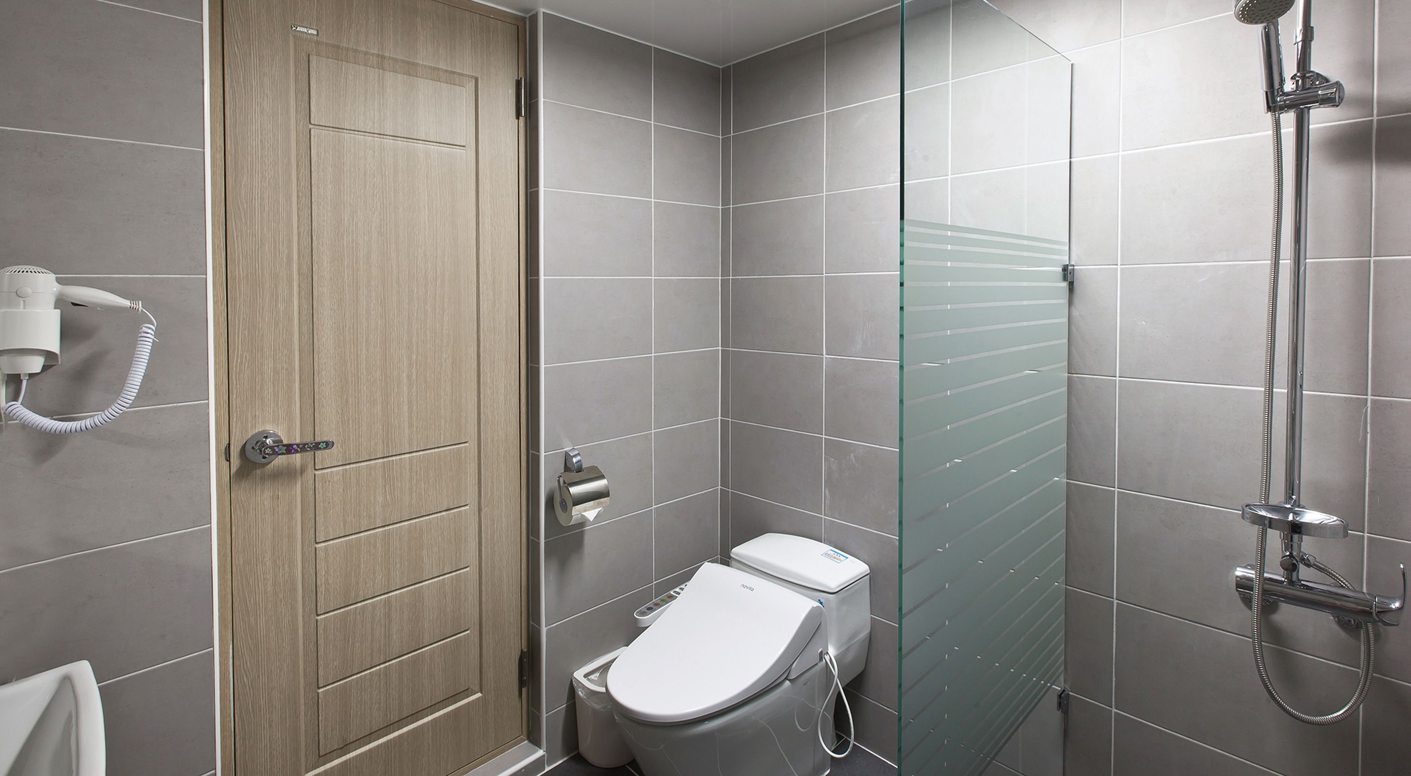 rainfall showerhead, designer toiletries, hair dryer, slippers