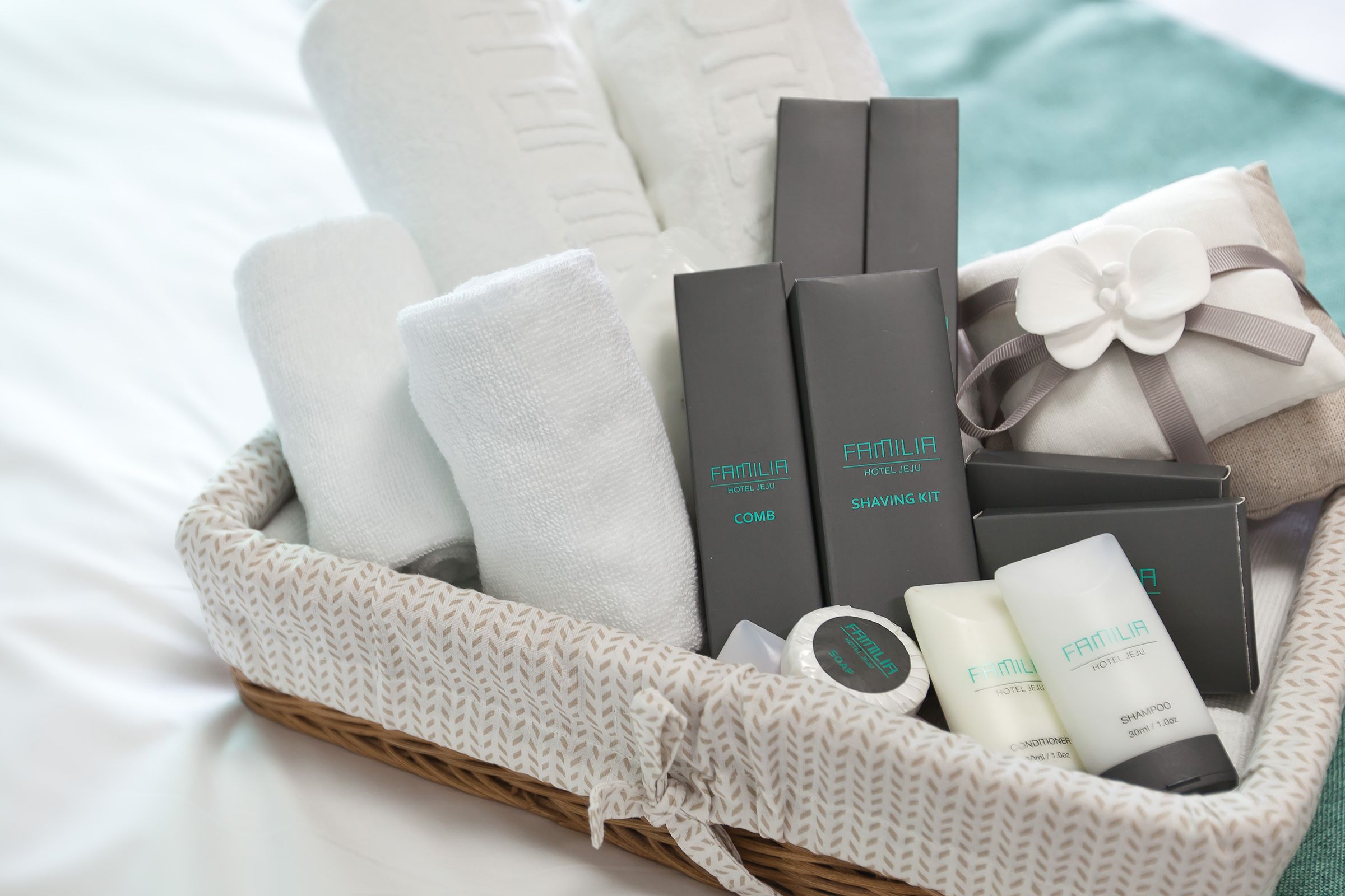 rainfall showerhead, designer toiletries, hair dryer, slippers