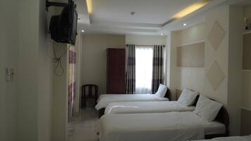 Family Room | Minibar, blackout curtains, free WiFi