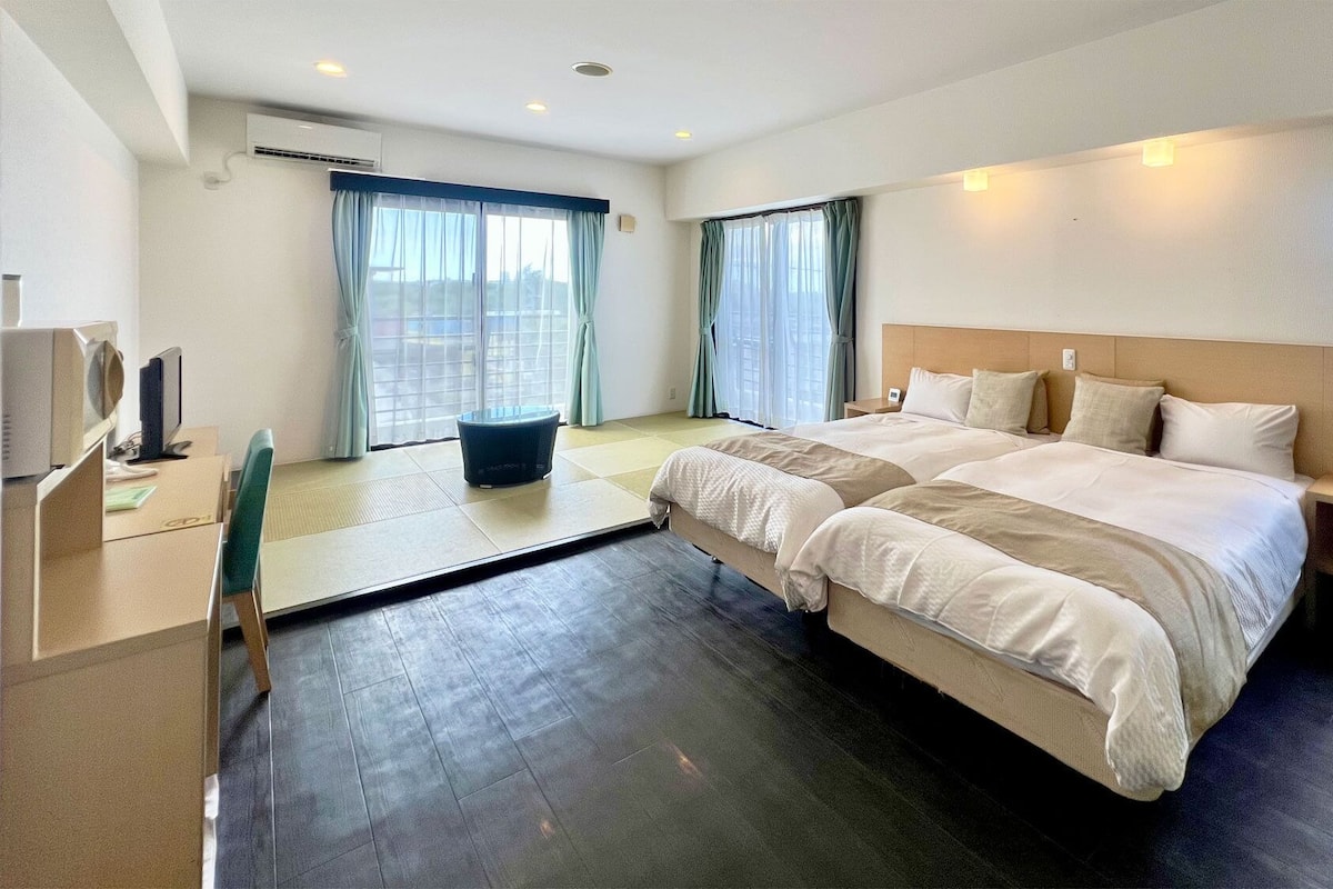 Premium bedding, down duvets, in-room safe, desk
