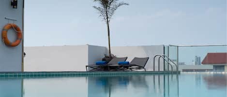 Outdoor pool, sun loungers