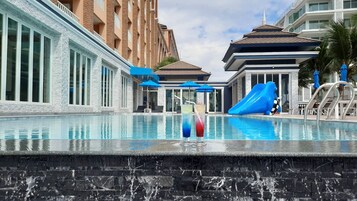 Outdoor pool, open 7:00 AM to 2:00 PM, free cabanas, pool umbrellas