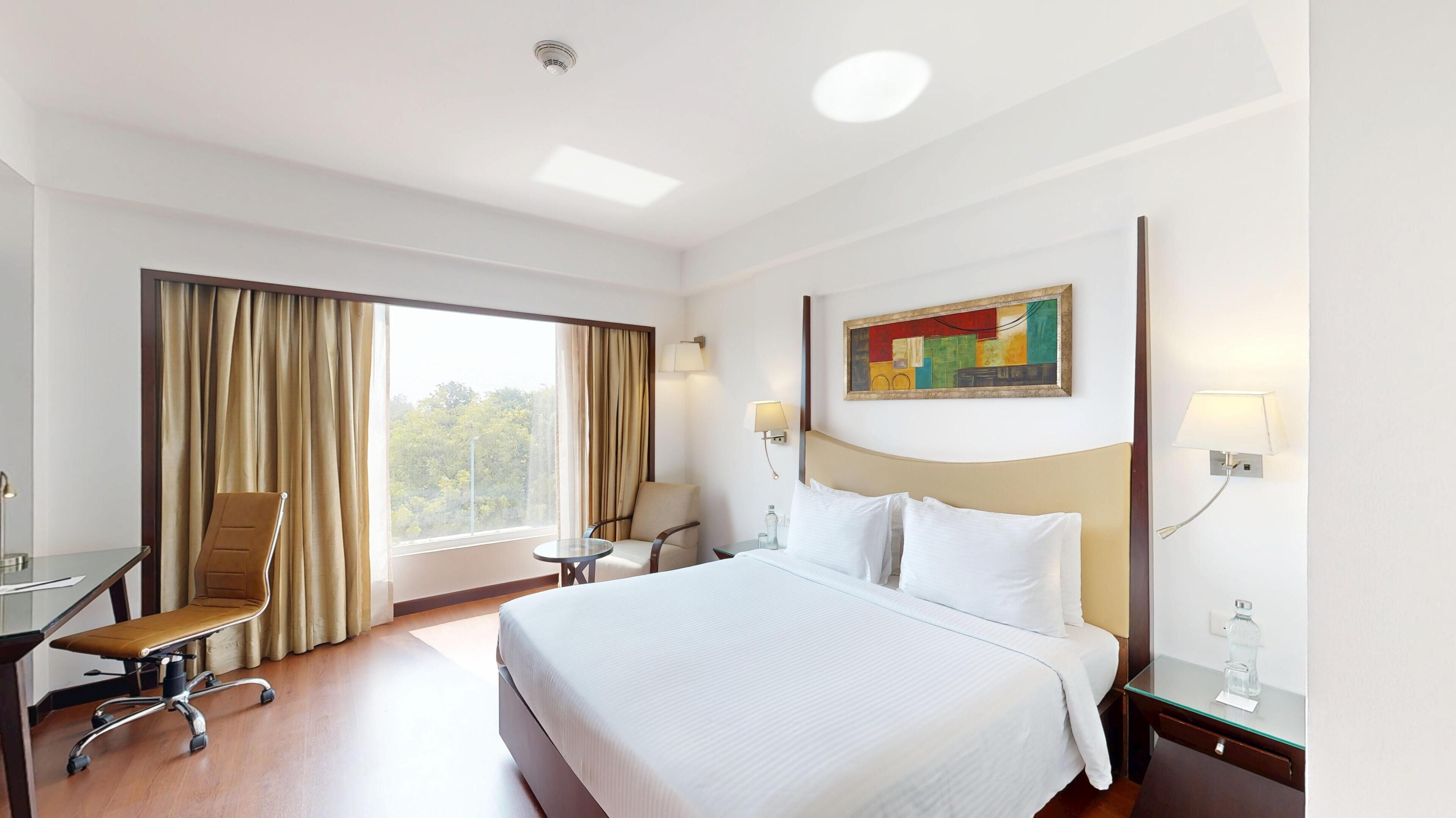 Down comforters, memory foam beds, minibar, in-room safe