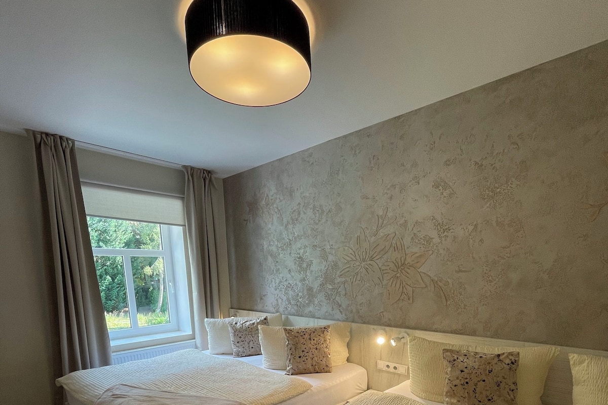 Suite (4) | 1 chambre, coffres-forts dans les chambres, Wi-Fi gratuit, draps fournis
