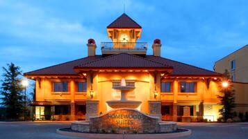 Stunning clock tower and central fountain greet you at Homewood Suites, set amidst beautifully landscaped grounds.