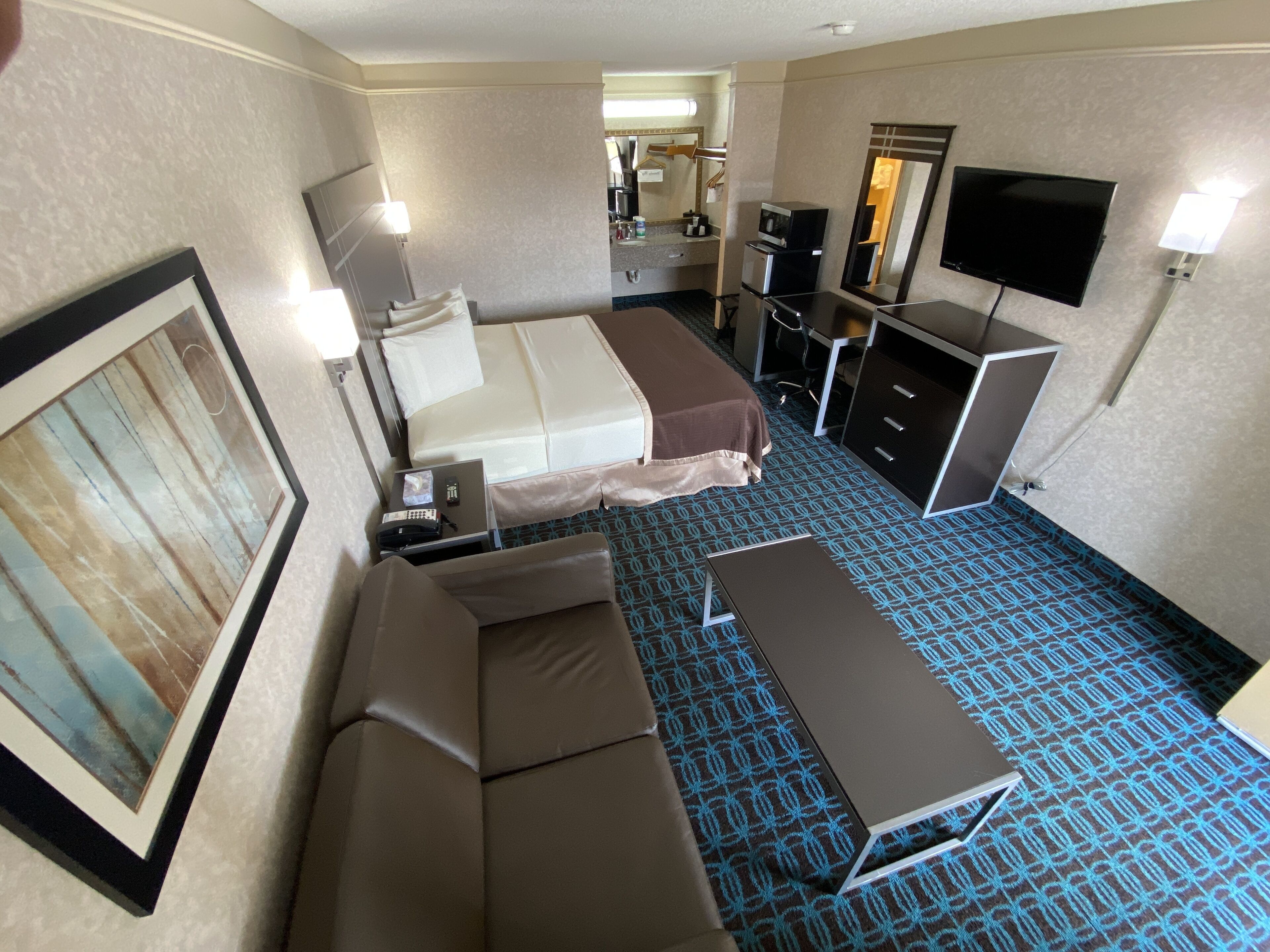 Premium bedding, pillow-top beds, desk, free WiFi