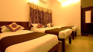 3 bedrooms, premium bedding, in-room safe, desk