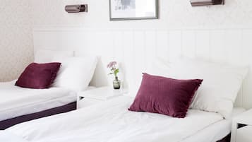 Escritorio, cortinas opacas, wifi gratis y ropa de cama