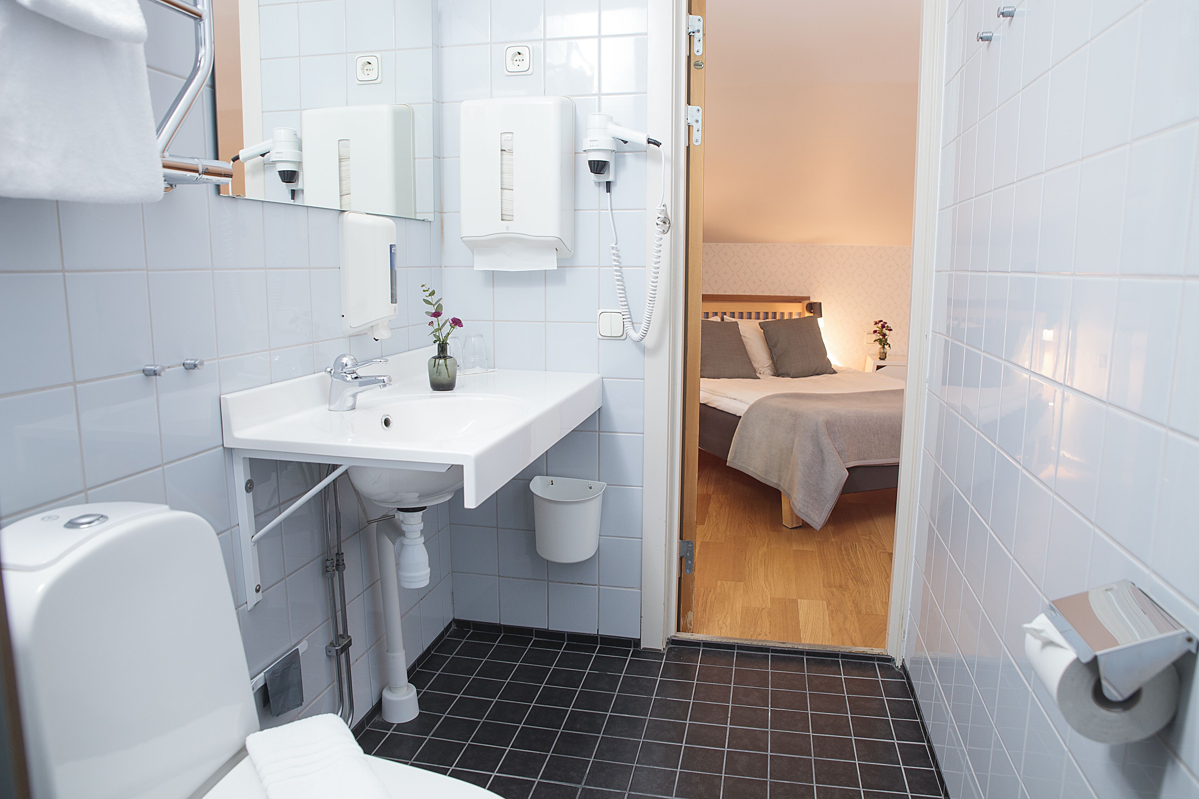 superior room | bathroom | shower, hair dryer, towels