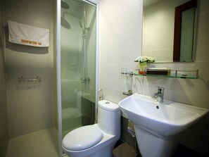 Shower, free toiletries, hair dryer, slippers