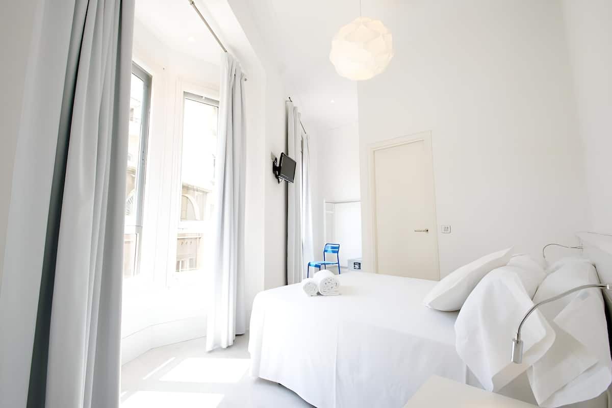 Habitación doble | Caja de seguridad en la habitación, wifi gratis y ropa de cama