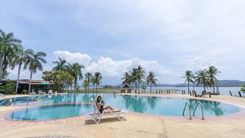 Outdoor pool, pool umbrellas, sun loungers