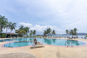 Outdoor pool, pool umbrellas, sun loungers