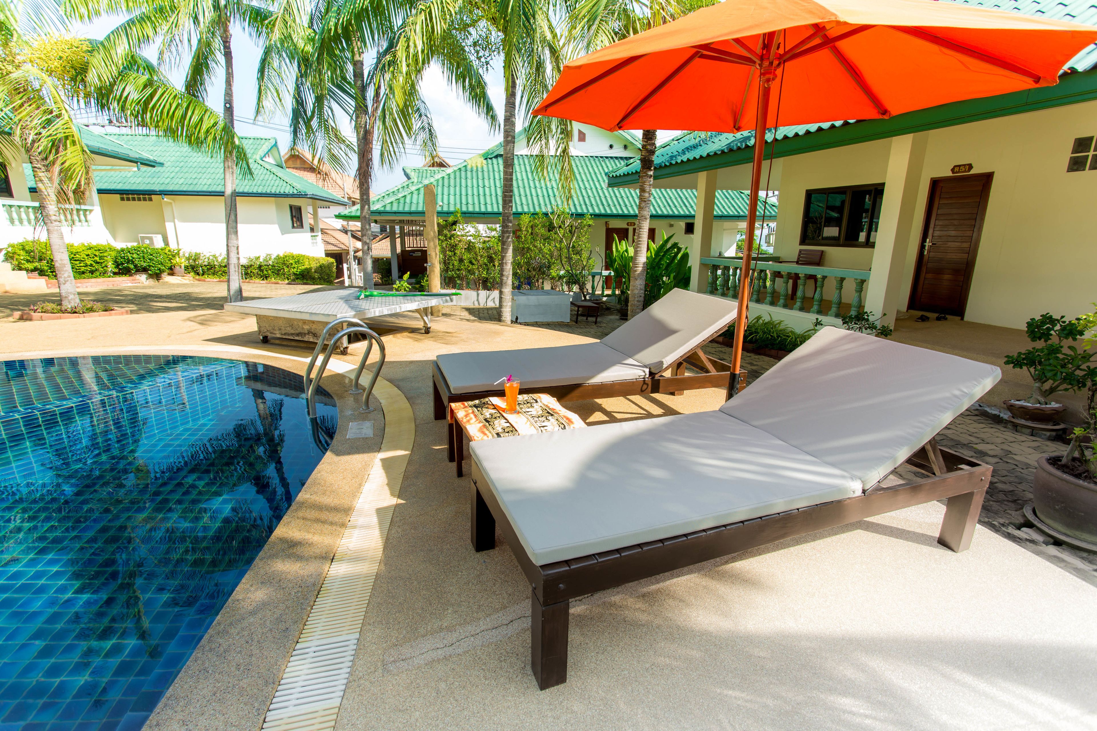 outdoor pool, pool umbrellas, pool loungers