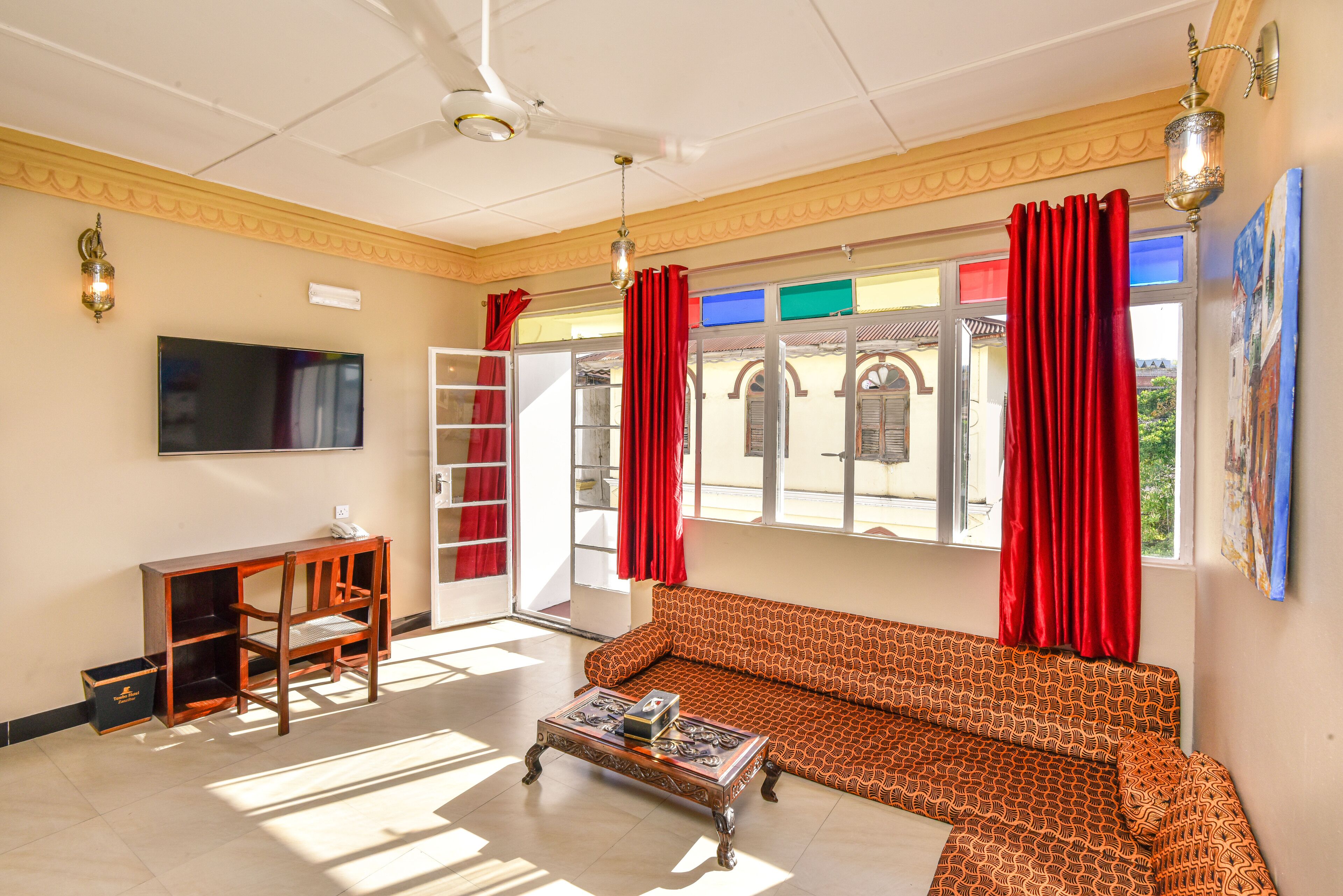 freddie mercury apartment with balcony and city view | living room | 32-inch led tv with cable channels, tv, table football