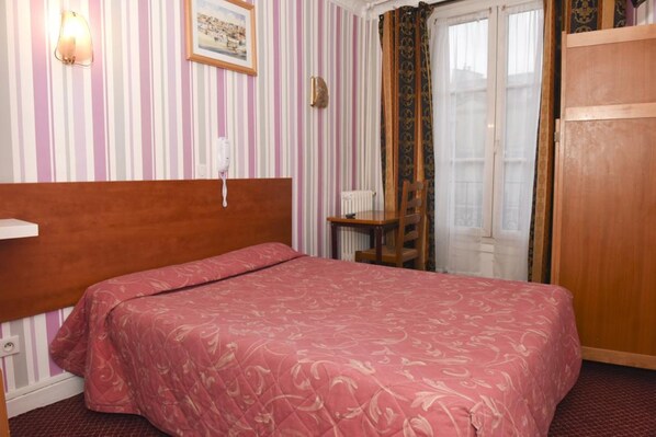 Sistema de insonorización y tabla de planchar con plancha