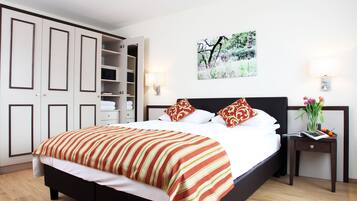 Premium bedding, down comforters, in-room safe, desk