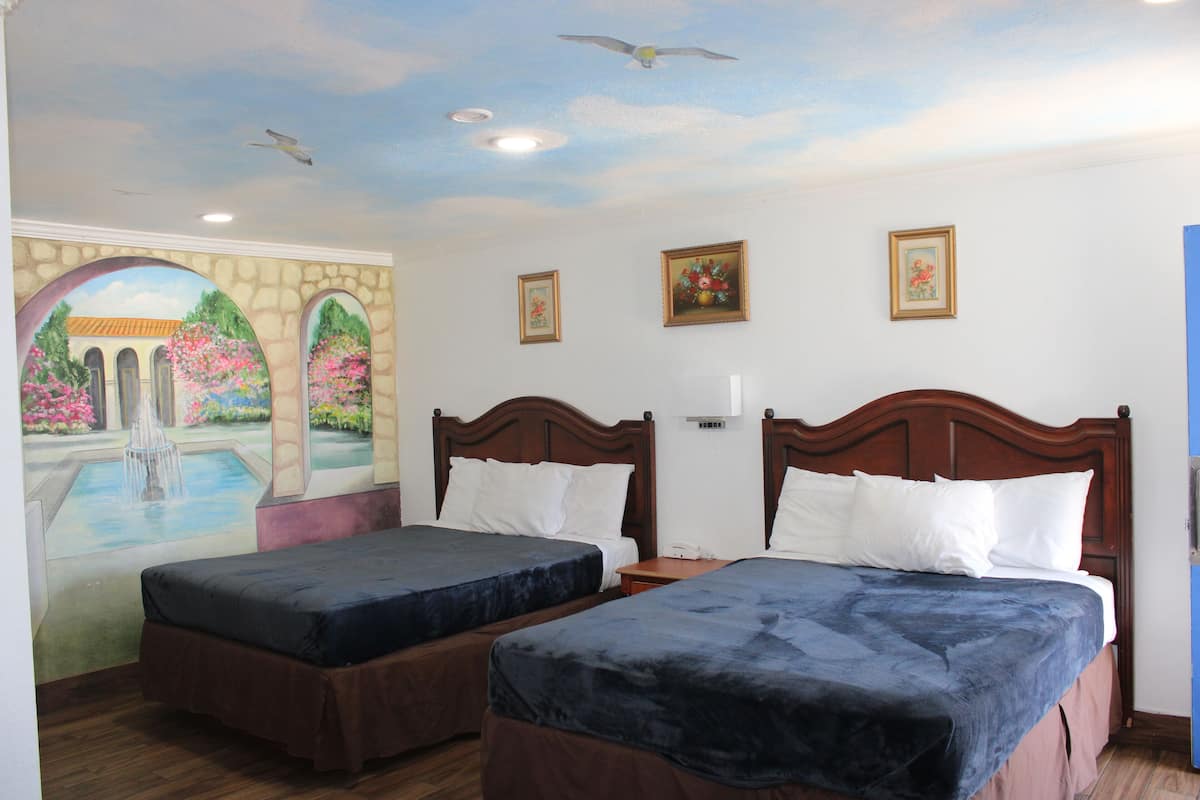 Family Room | Desk, blackout drapes, iron/ironing board, free WiFi
