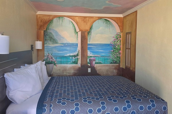 Basic Room, 1 Queen Bed | Desk, blackout drapes, iron/ironing board (on request), WiFi (free)