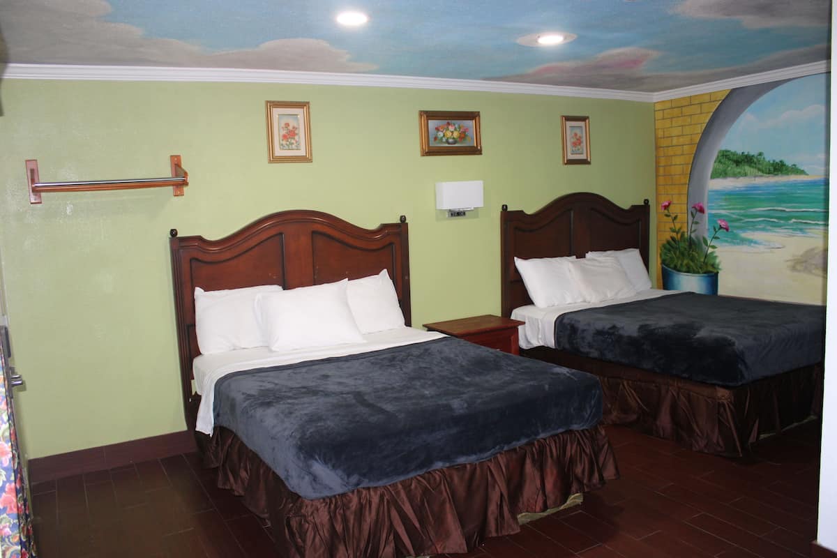 Economy Room, 2 Queen Beds | Desk, blackout drapes, iron/ironing board, free WiFi