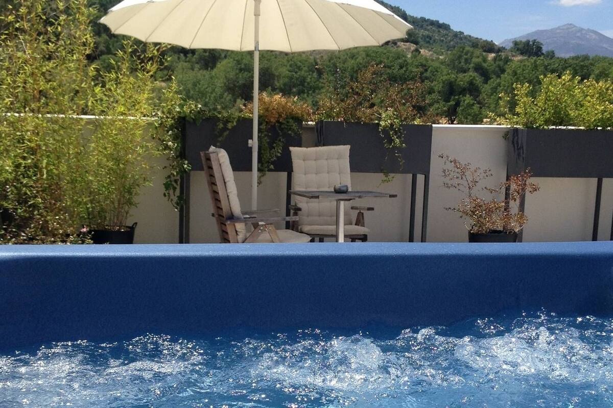 Junior Suite, 1 Bedroom, Hot Tub, Mountain View | In-room safe, desk, rollaway beds, free WiFi