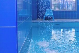 Indoor pool, open 8:00 AM to 8:00 PM, lifeguards on site