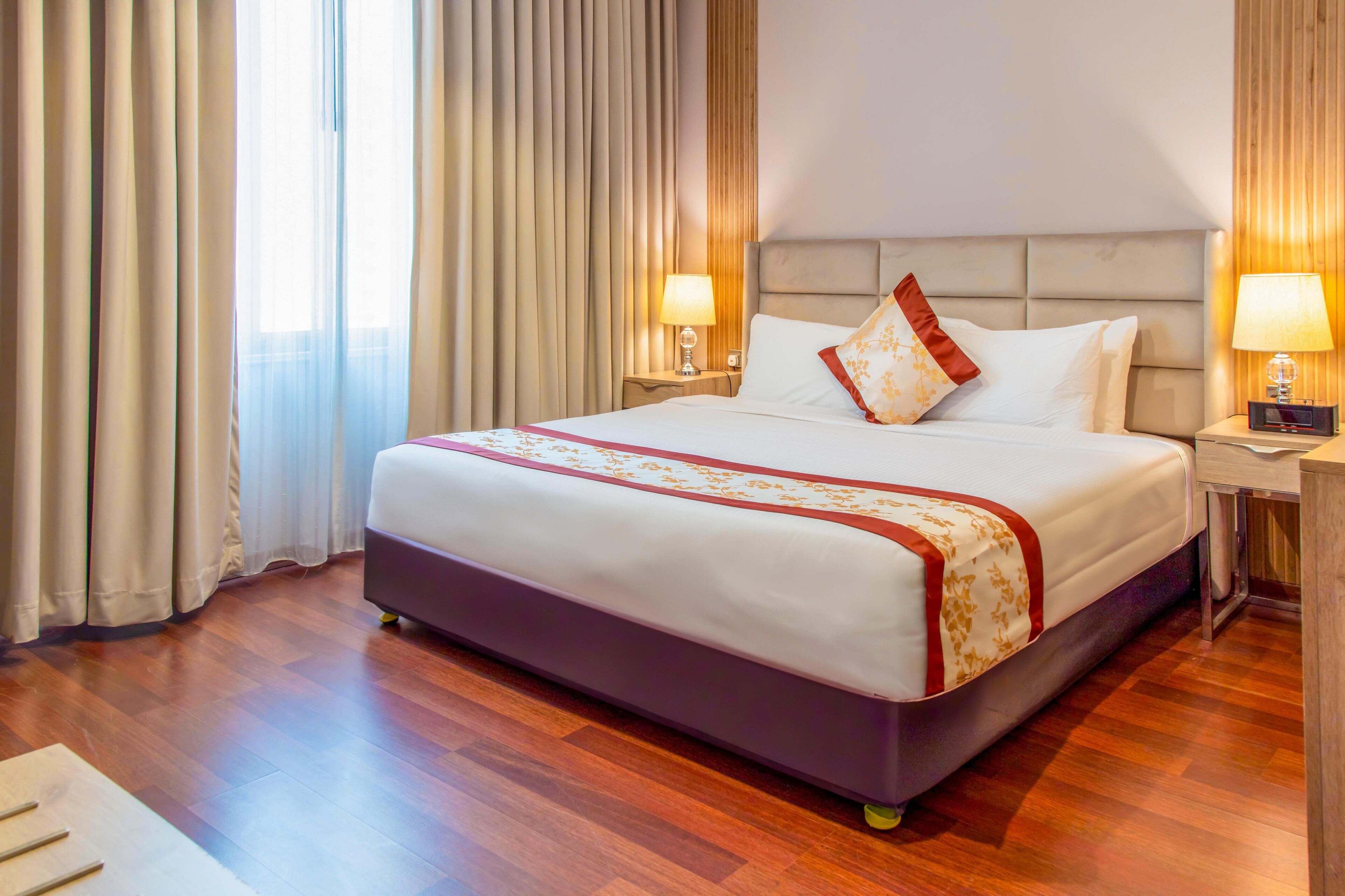 Deluxe Two Bedroom Family Suite | Minibar, in-room safe, desk, laptop workspace