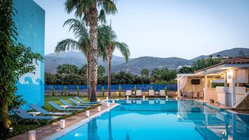 Outdoor pool, pool umbrellas, pool loungers