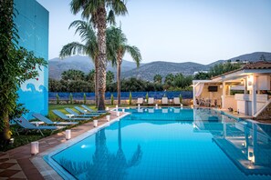 Outdoor pool, pool umbrellas, pool loungers