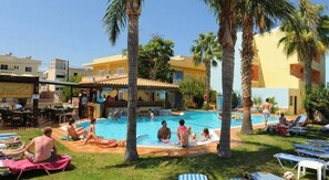 Outdoor pool, pool umbrellas, pool loungers