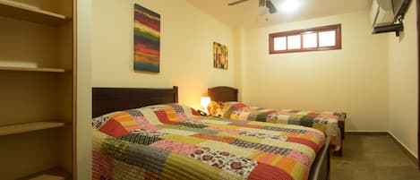 Standard Twin Room, Multiple Beds, Private Bathroom, Partial Ocean View | Free WiFi, bed sheets