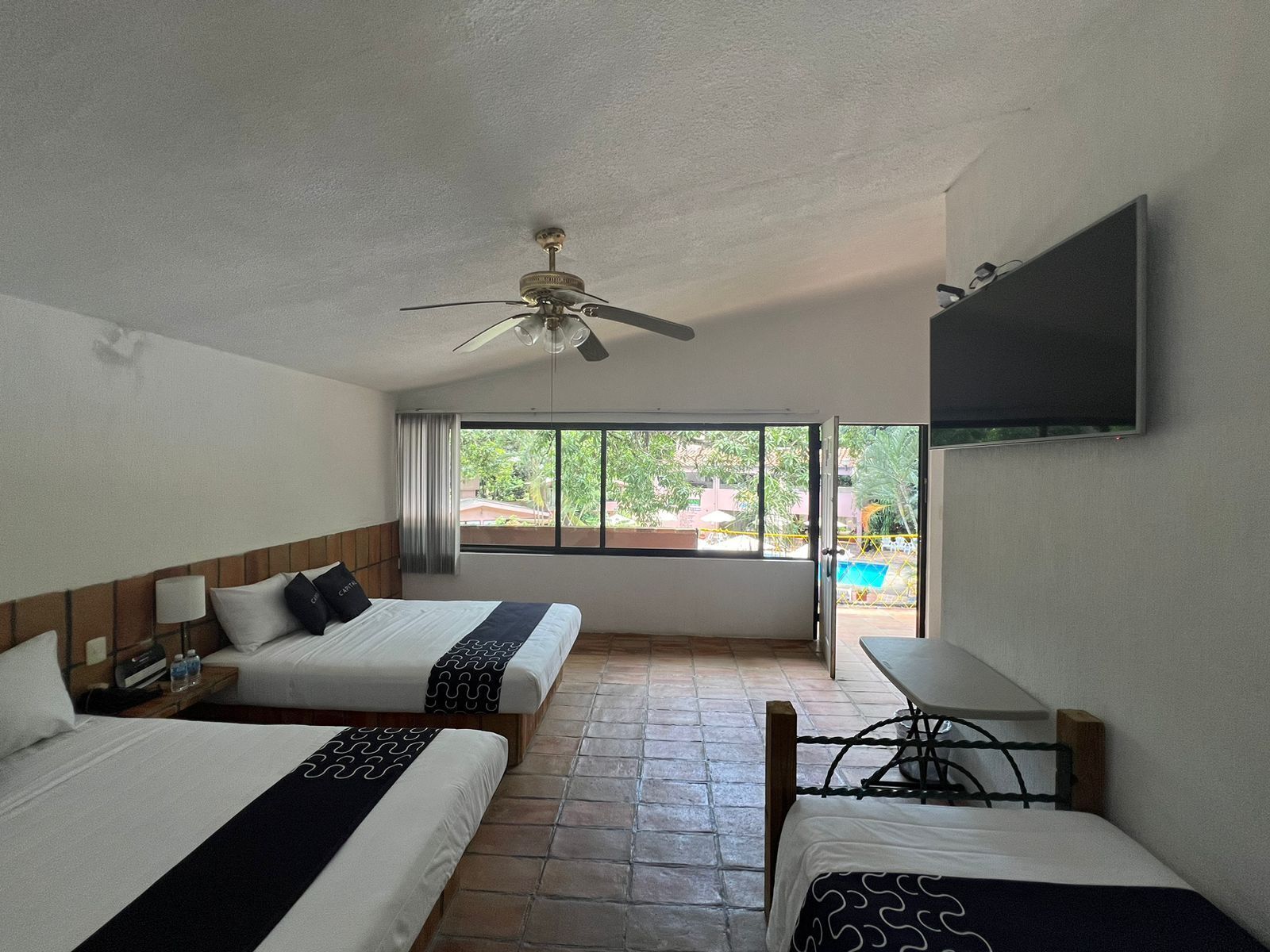 Habitación superior | Caja de seguridad en la habitación, wifi gratis y ropa de cama 