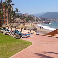 On the beach, sun-loungers, beach umbrellas, beach towels
