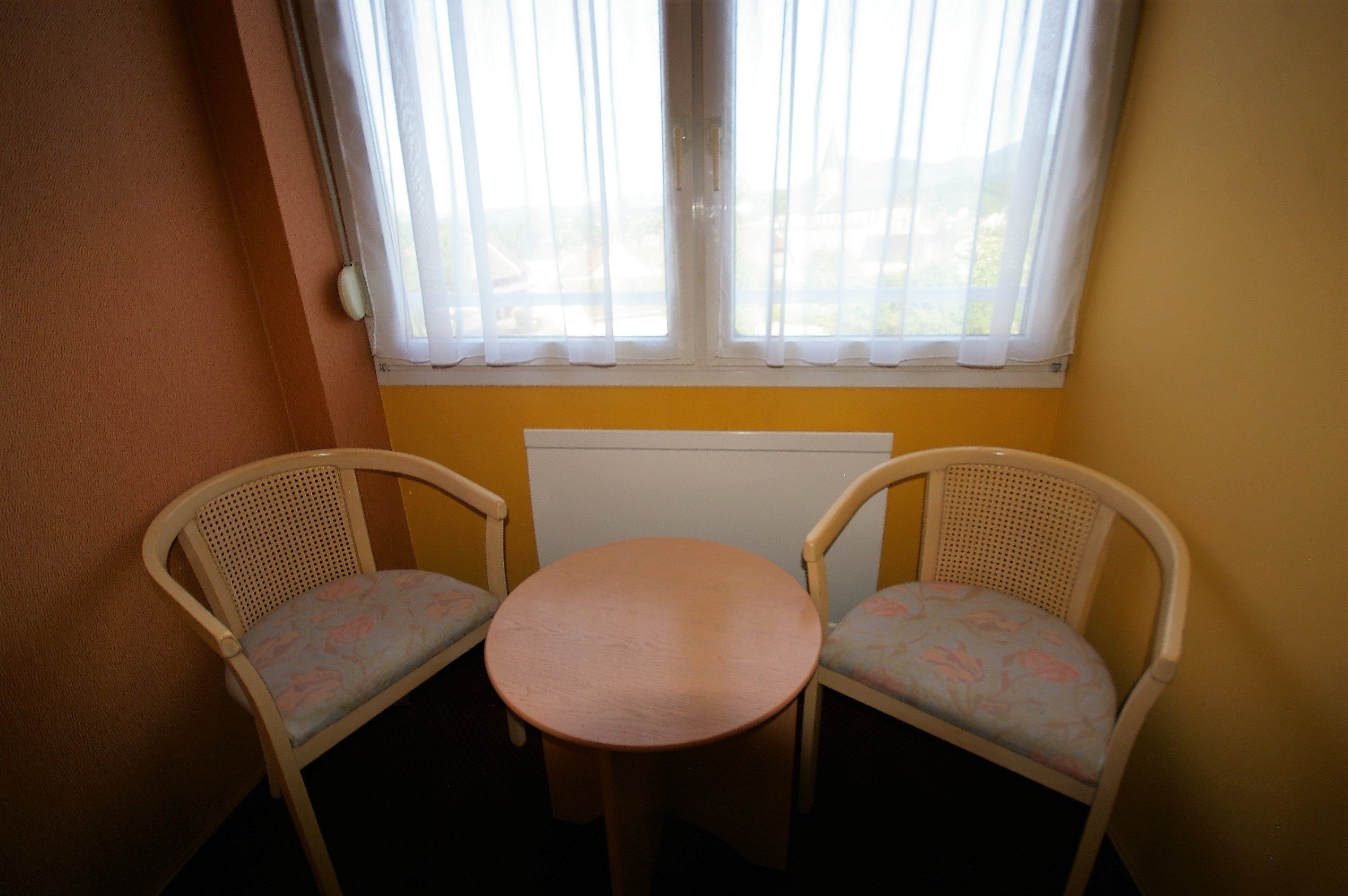 standard double room | living area | flat-screen tv