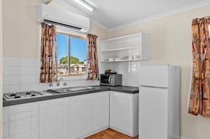 Standard 1 Bedroom Cabin - Sleeps 4 | Private kitchenette | Microwave, coffee/tea maker, toaster