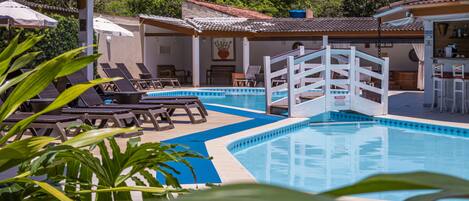 2 outdoor pools, pool umbrellas, pool loungers