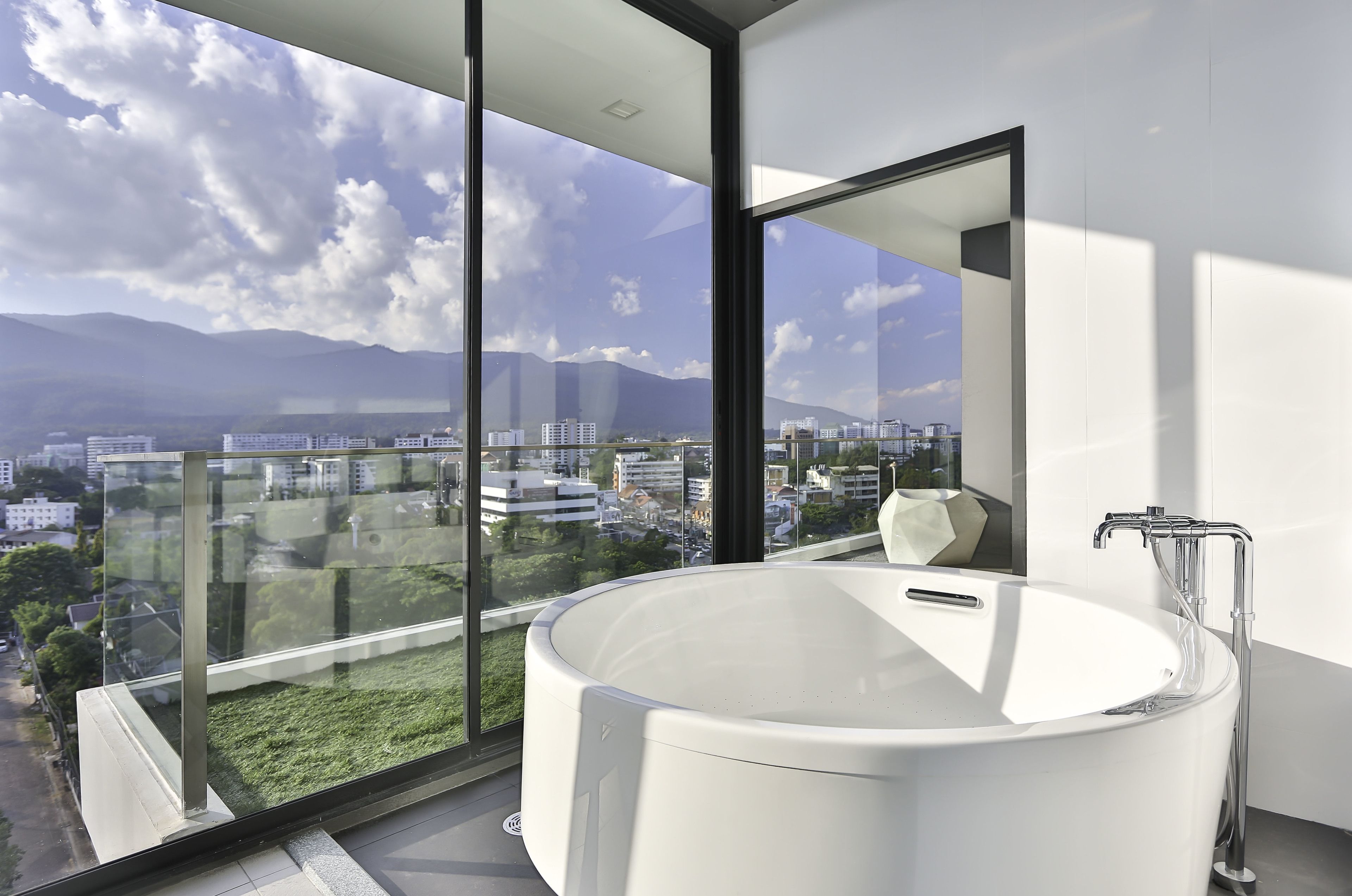 two bedroom suite with bathtub | deep-soaking bathtub