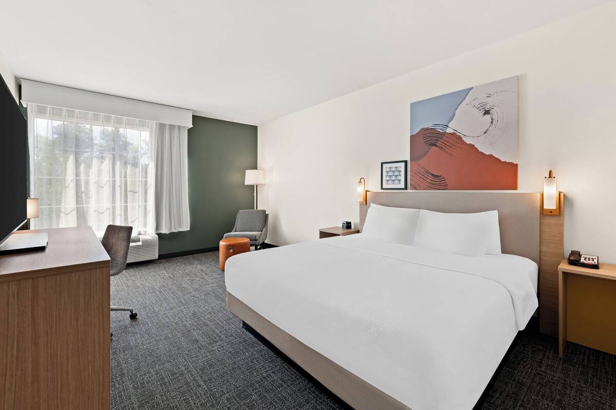 Premium bedding, pillowtop beds, desk, laptop workspace