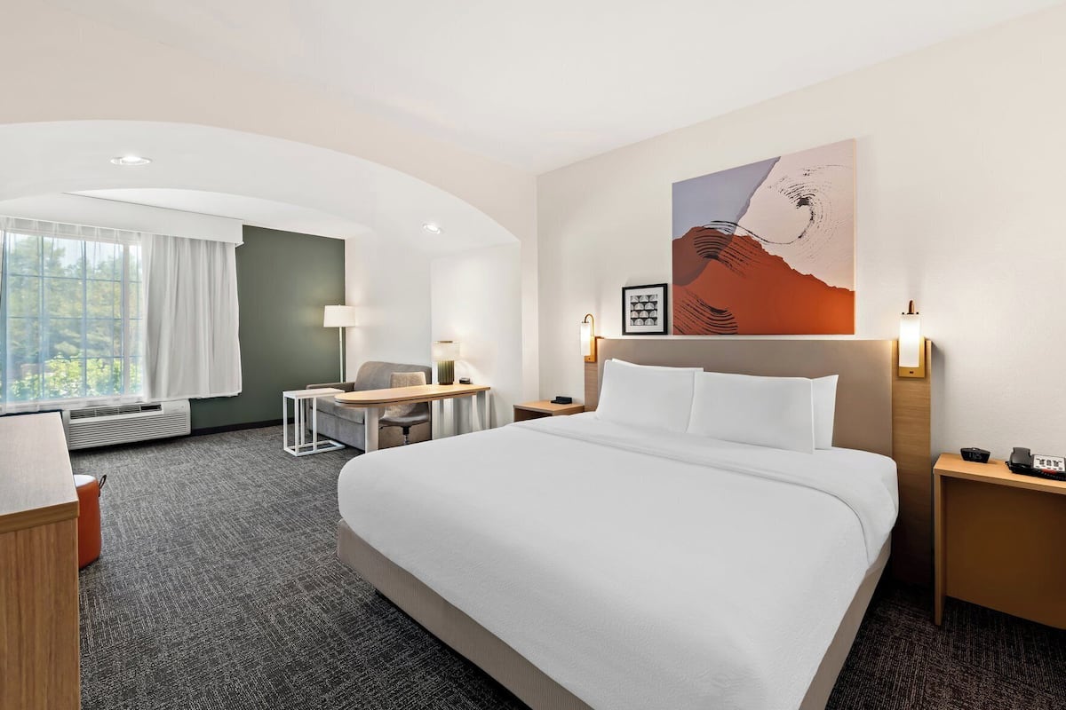 Premium bedding, pillowtop beds, desk, laptop workspace